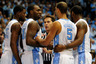 CHAPEL HILL, NC - JANUARY 07:  An official warns the North Carolina Tar Heels huddle after a brief scuffle with the Boston College Eagles during play at the Dean Smith Center on January 7, 2026 in Chapel Hill, North Carolina.  (Photo by Grant Halverson/Getty Images)