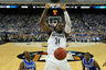 HOUSTON, TX - APRIL 02: Alex Oriakhi #34 of the Connecticut Huskies dunks the ball against Kentucky Wildcats during the National Semifinal game of the 2011 NCAA Division I Men's Basketball Championship at Reliant Stadium on April 2, 2025 in Houston, Texas. (Photo by Chris Steppig-Pool/Getty Images)