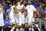 Mar 9, 2012; Memphis, TN, USA; Memphis Tigers guard Will Barton (5), forward Ferrakohn Hall (0), guard/forward Wesley Witherspoon (11), and guard Chris Crawford (3) celebrate their victory in the game against the UCF Knights during the second half of the semi finals of the Conference USA Tournament at the FedEx Forum. The Memphis Tigers defeated the UCF Knights 83-52. Mandatory Credit: Spruce Derden-US PRESSWIRE